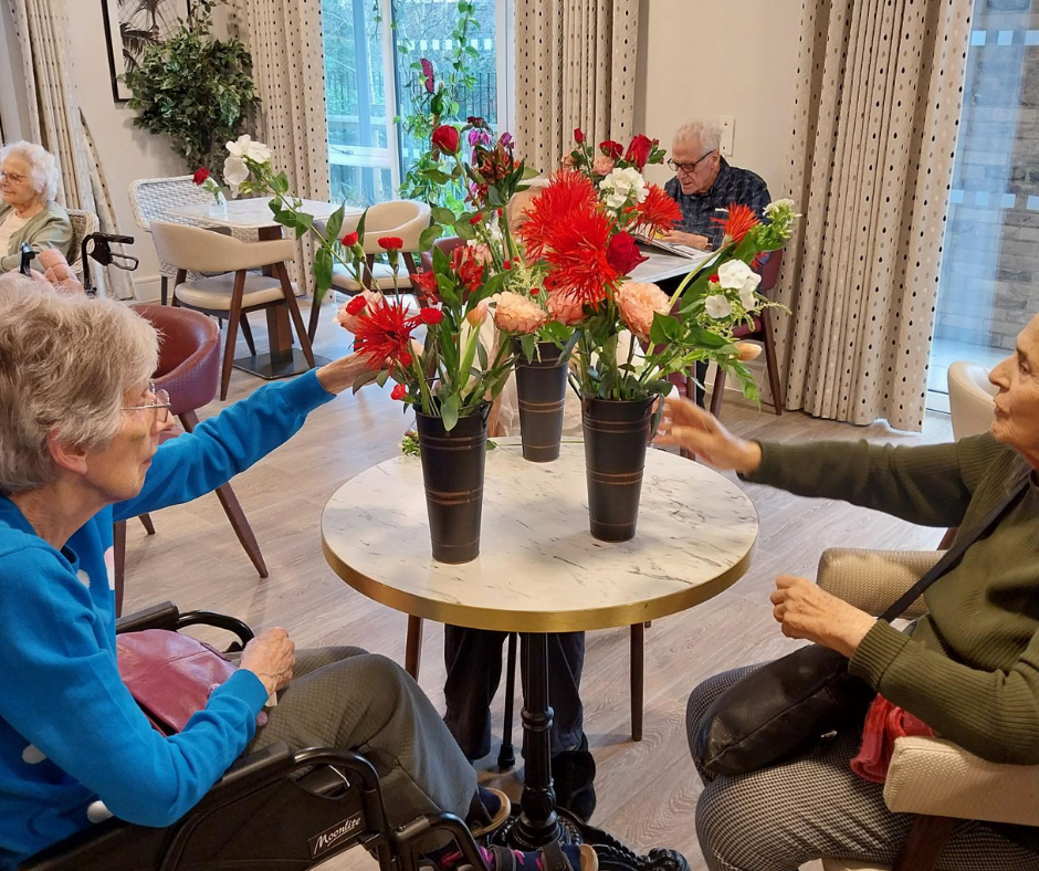 residents arranging flowers at Brookwater House in Palmers Green