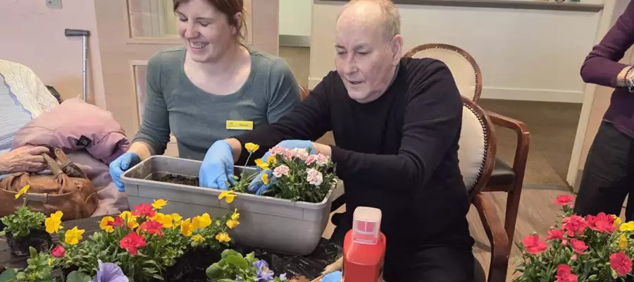 Newton House residents spread sunshine through gardening project