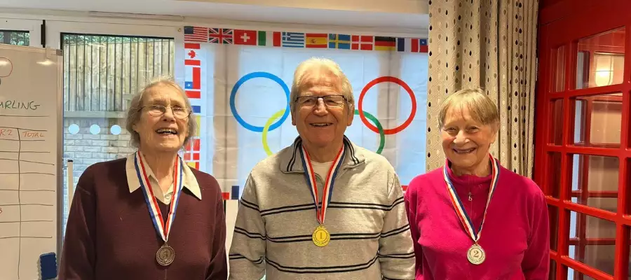 Curling Competition Brings Winter Olympics Spirit to Dorking Manor